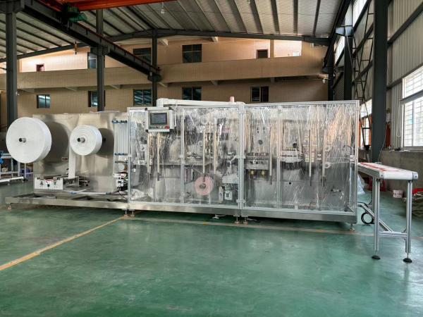 Fully automatic high speed wet wipes manufacturing machine
