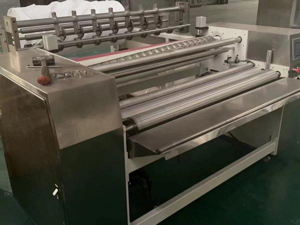 CW-FJJ-300  Semi-automatic non woven perforating and rolling machine